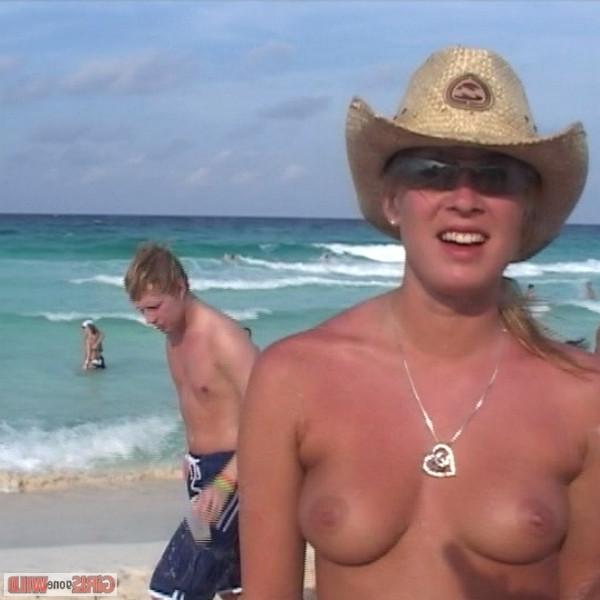 10P Drunk cowgirl on the beach takes off her top
