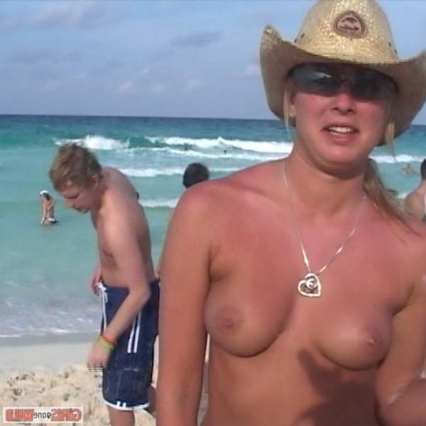 10P Drunk cowgirl on the beach takes off her top