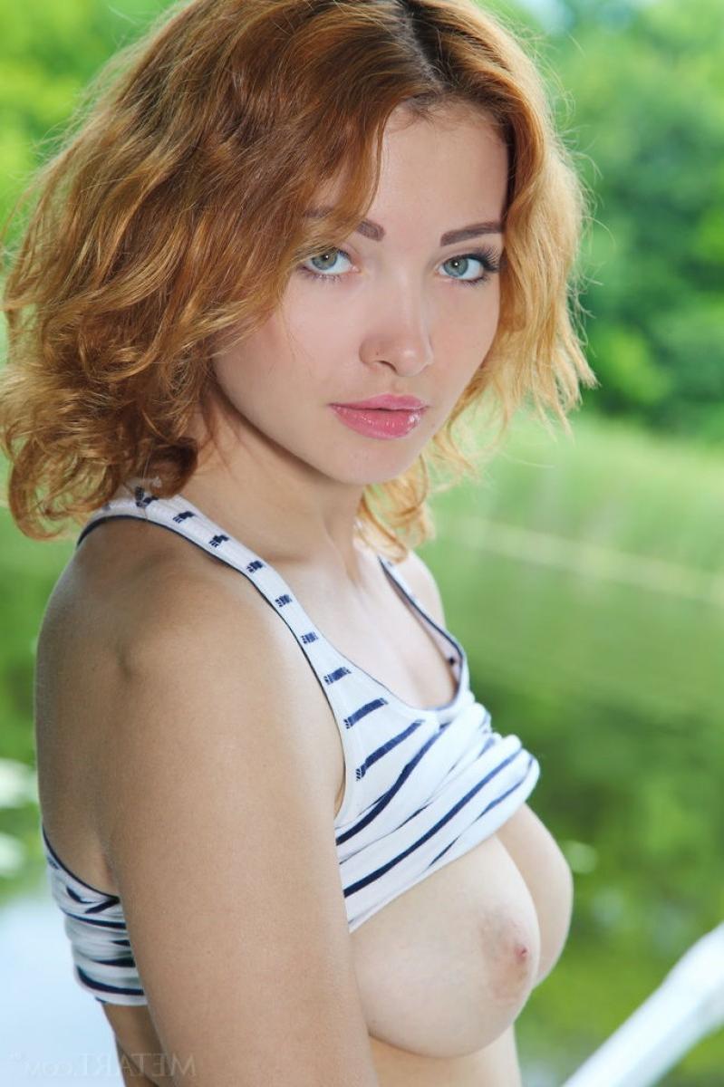12P Busty nude chick on a boat