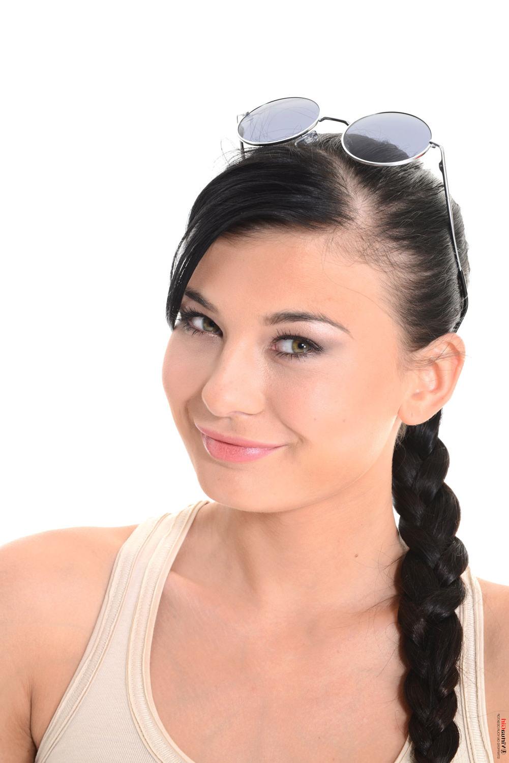 15P Sweet brunette teen Lucy poses like a Lara Croft