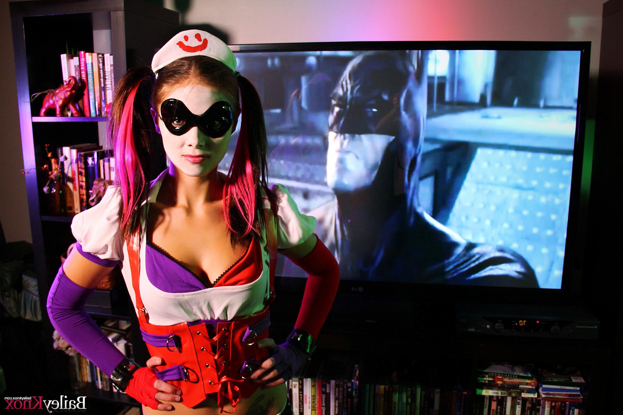 16P Naughty petite brunette poses like a Harley Quinn