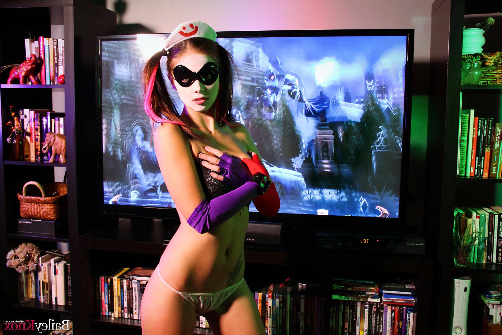 16P Naughty petite brunette poses like a Harley Quinn
