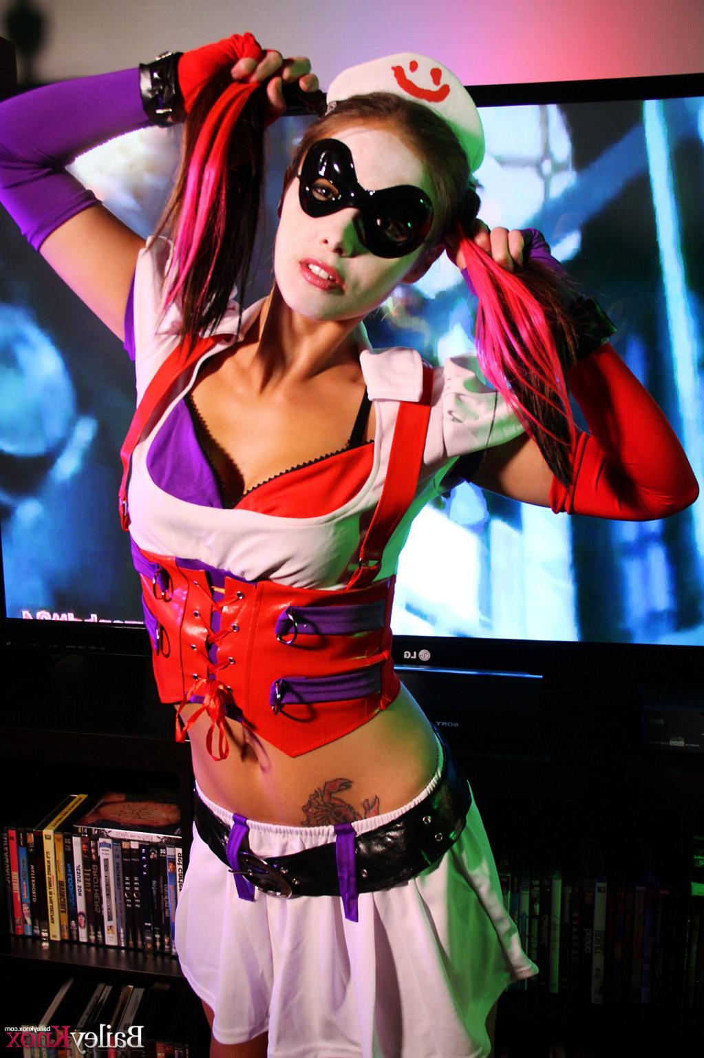 16P Naughty petite brunette poses like a Harley Quinn