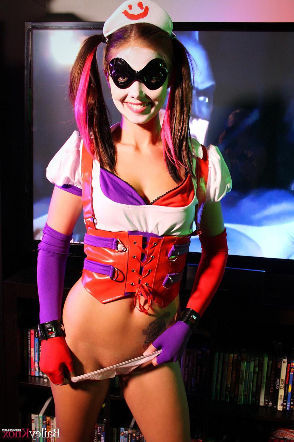 16P Naughty petite brunette poses like a Harley Quinn