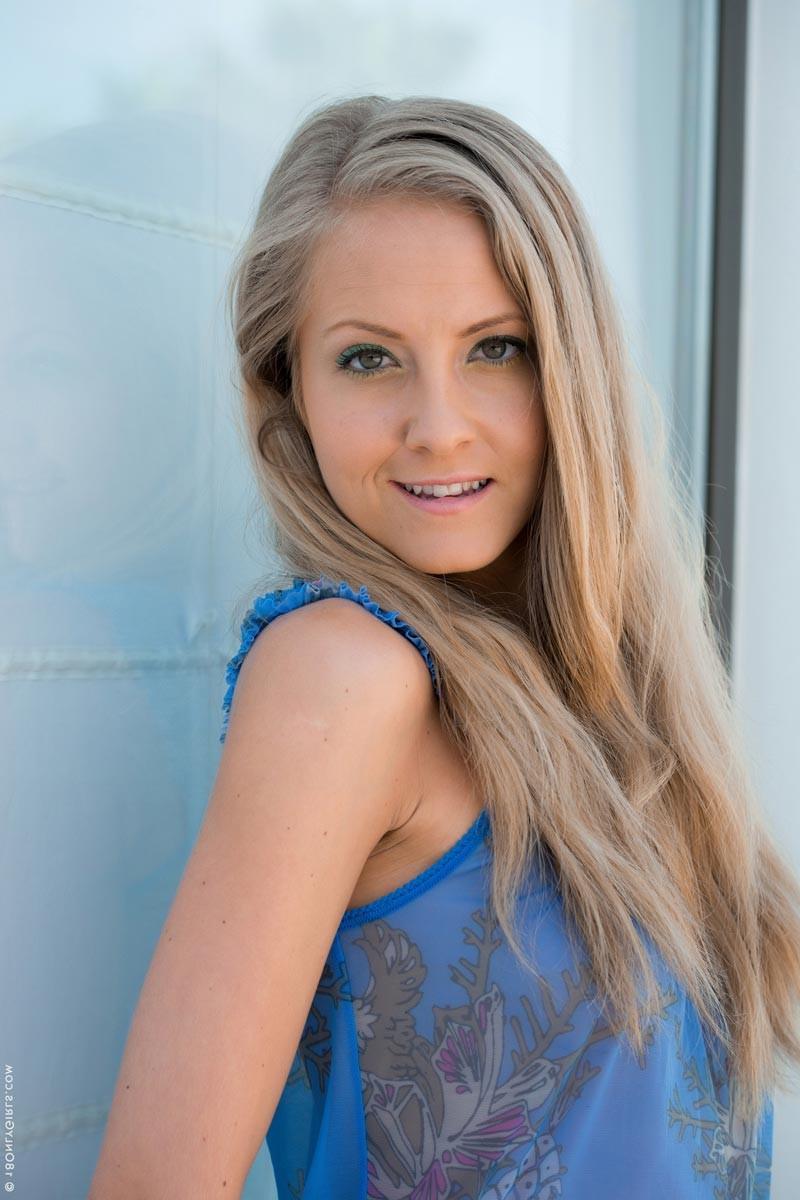 15P Sexy slim blonde in a blue dress