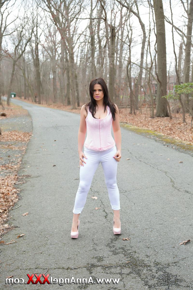 15P Sexy brunette in her pink corset and yoga pants