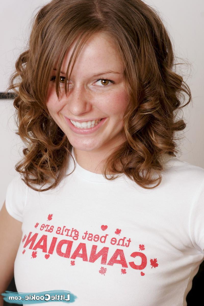 15P Petite redhead cutie takes off her white clothes