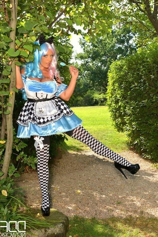 16P Delzangel busty cosplay blonde with blue hair plays outdoor