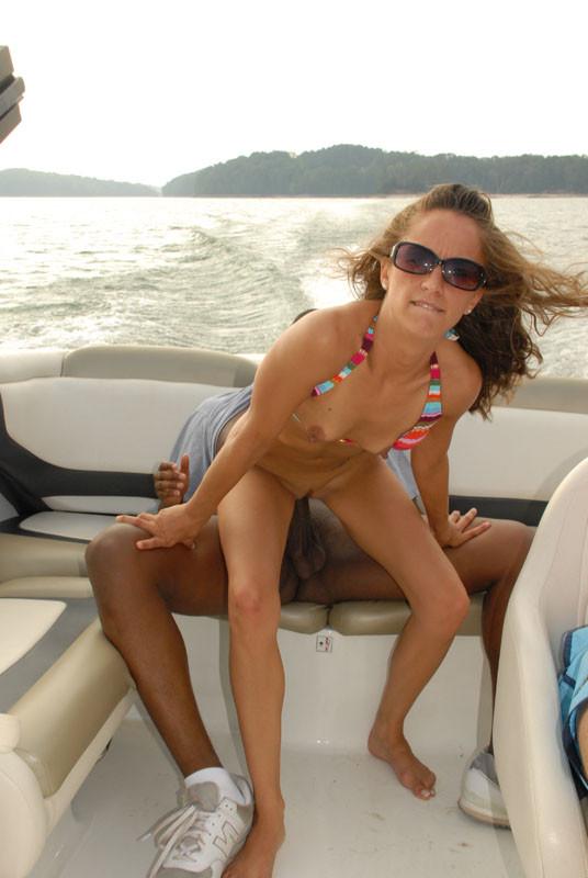 20P Bawd stripping for the captain.|Hot chick gets banged in a boat.|Clam gets munch
