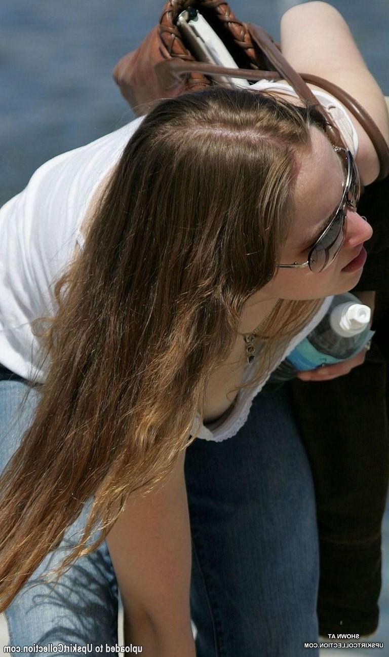 15P Tight corset squeezes big tits and uncovers downblouse
