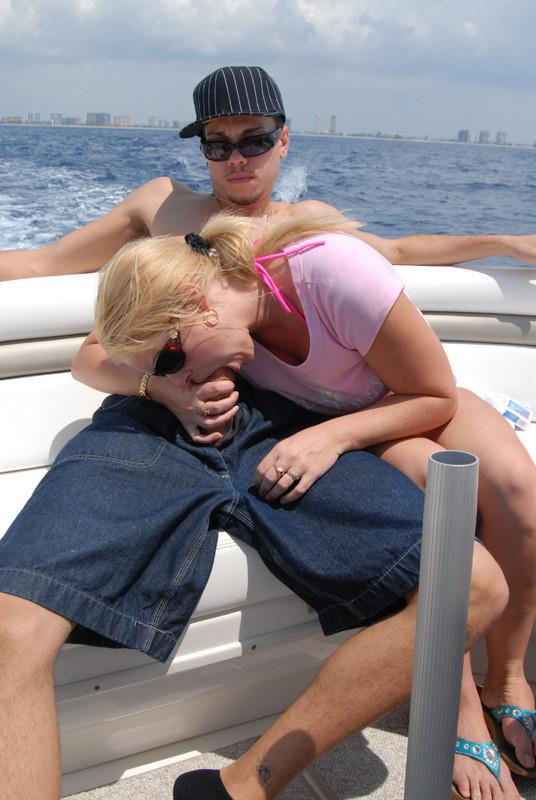 16P Dirty blonde slut gives head on the back of a boat