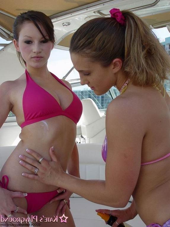 16P Two amateur teens in bikini on a boat