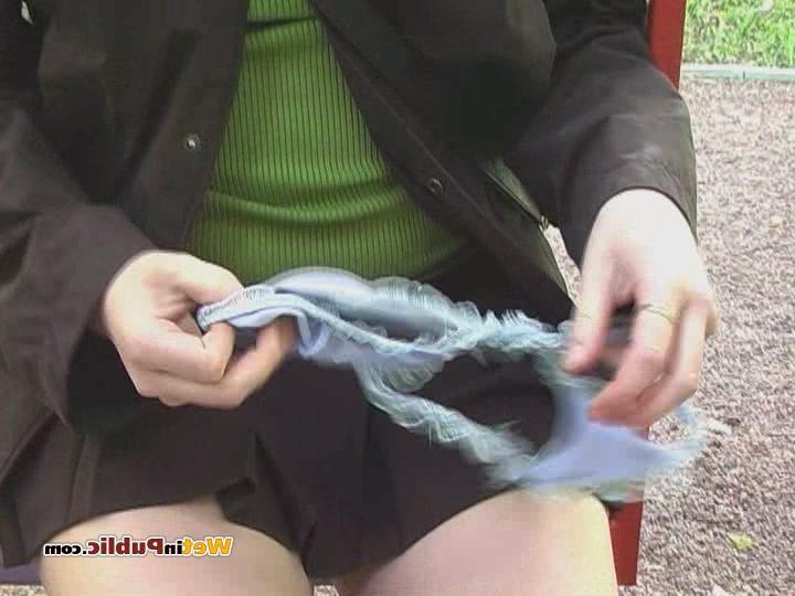15P Wet black skirt and blue panties of a gal who pissed herself in public