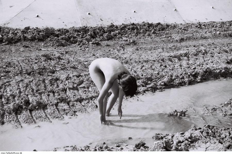 15P Naked girl in slush. Outdoors erotica