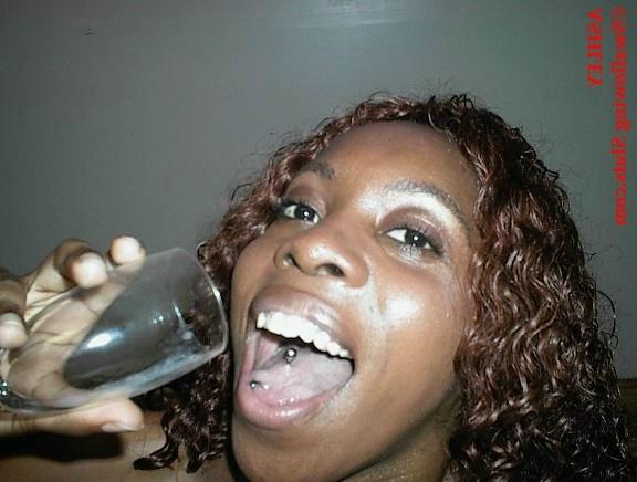 17P Ebony babe drinks a glass of cum