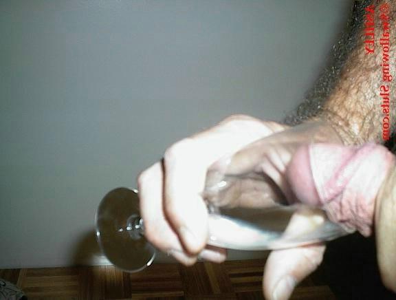 17P Ebony babe drinks a glass of cum