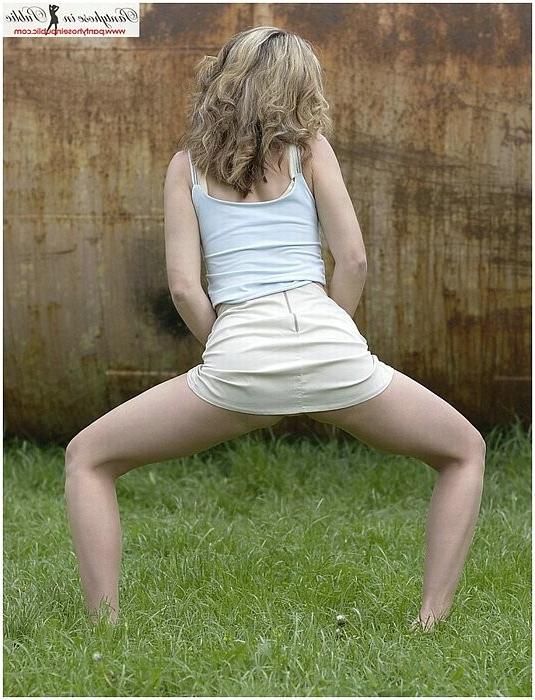 15P Blonde babe in pantyhose exposing by industrial pipe outdoors