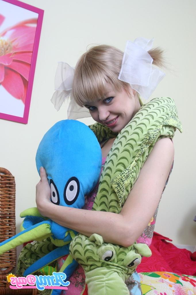 16P Blonde teen plays with stuffed toys