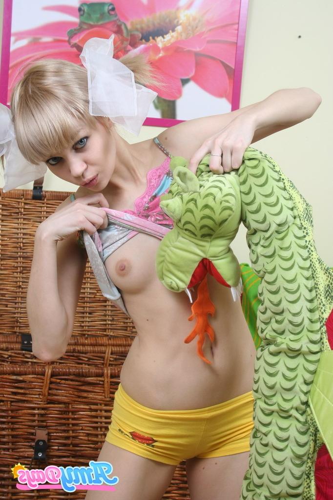 16P Blonde teen plays with stuffed toys