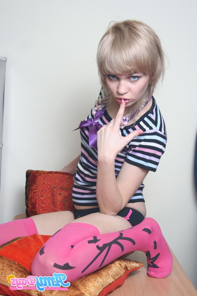 16P Playful blonde teen girl striptease