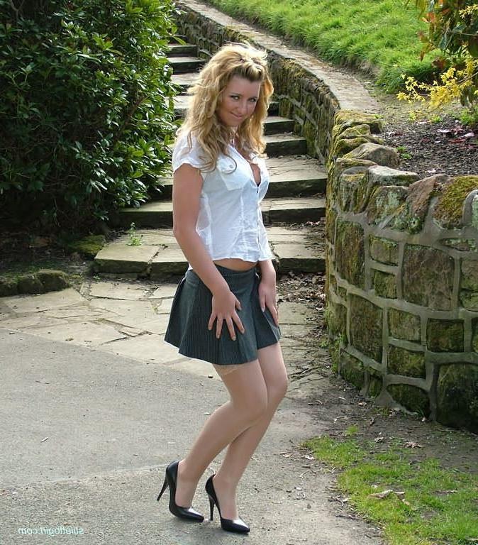 15P Shy blonde babe in stockings and heels outdoors