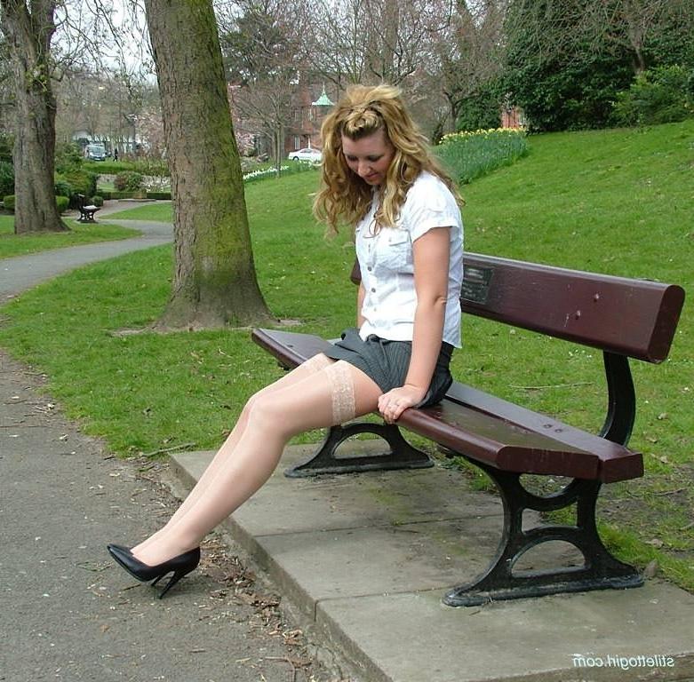 15P Shy blonde babe in stockings and heels outdoors