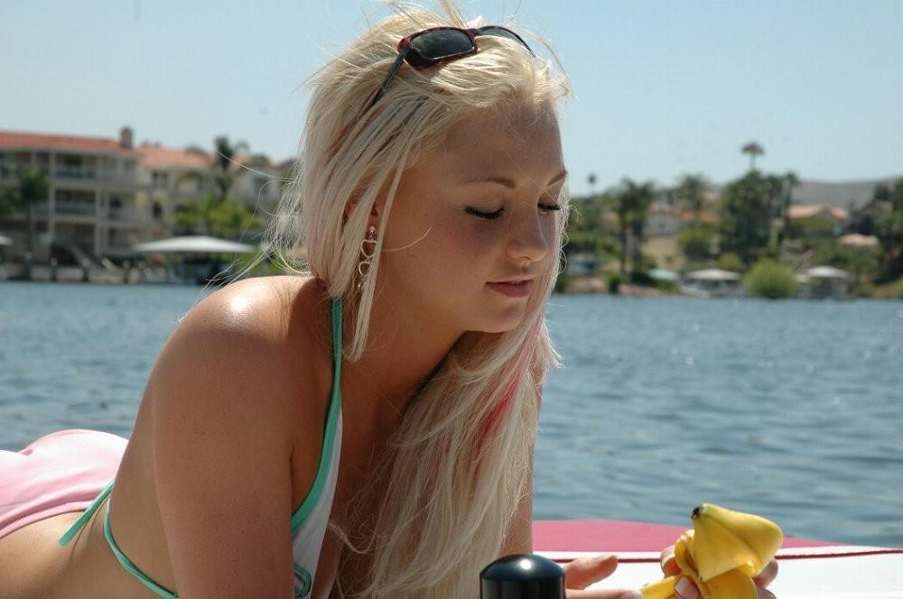 15P Bikini blonde girl laying around like a rich girl on the boat
