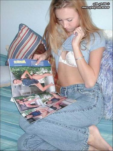 17P Dirty Aly strips on her bed for the fun of it.
