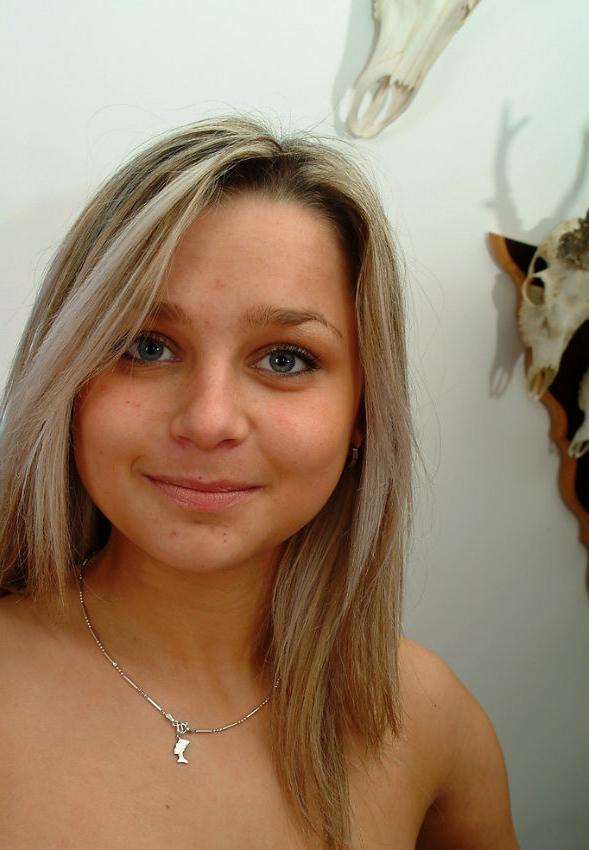 20P Stunning busty teen spreads on sofa