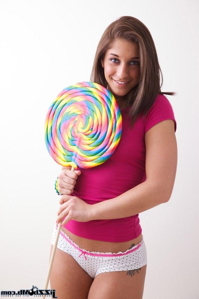 18P Mischa Brooks licks a big lollipop and fucks on the couch