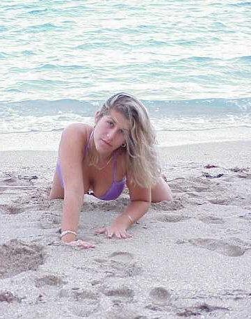13P Babe getting naked on the beach has a freakish big clits