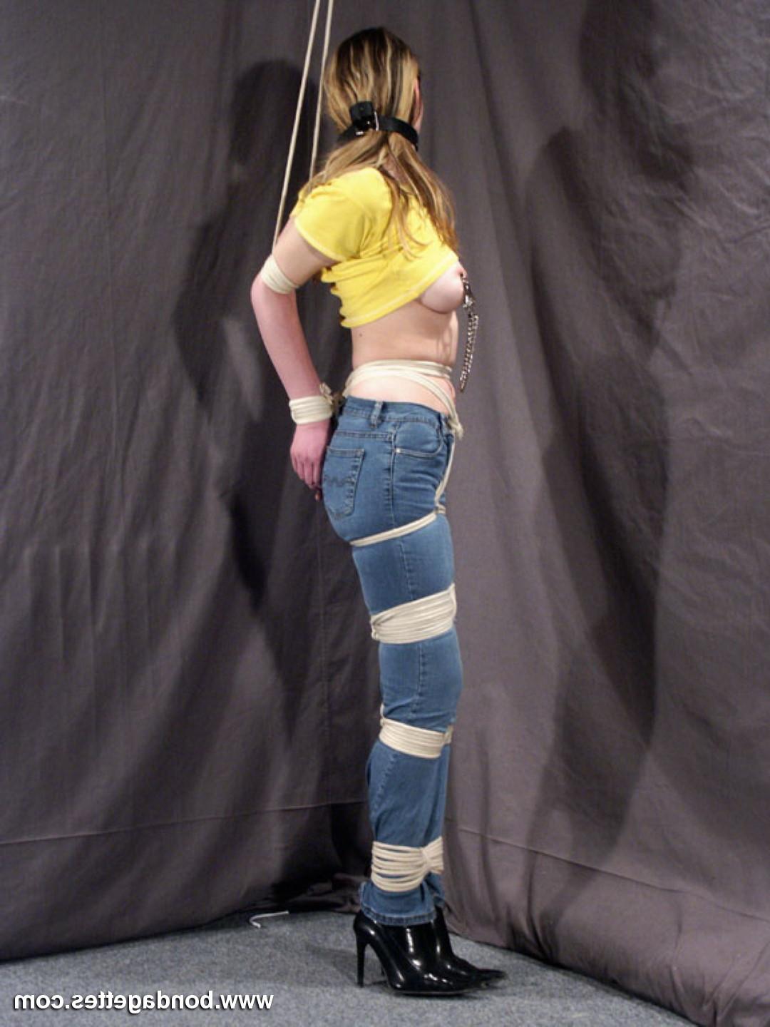 16P Amateur blonde subbie Isanne is tied up wearing blue jeans by he