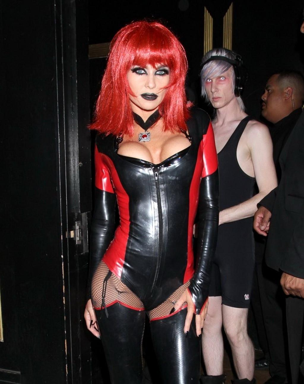 16P Carmen Electra wearing a slutty latex costume for a Halloween party at Bootsy Be