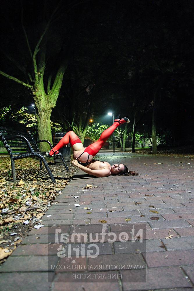 7P A girl is posing nude outdoor