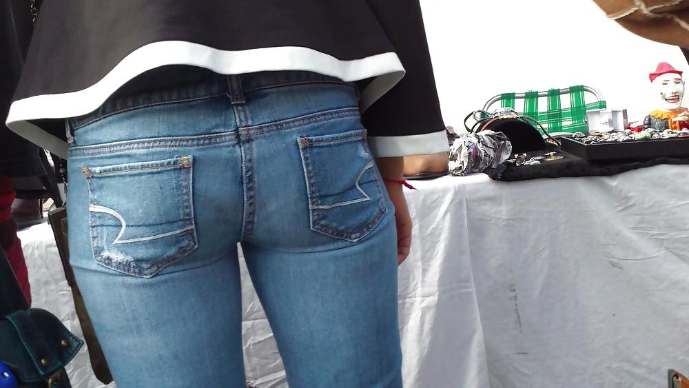 21P Very tight sexy teen ass & butt in blue jeans
