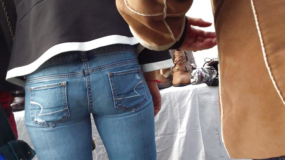 21P Very tight sexy teen ass & butt in blue jeans