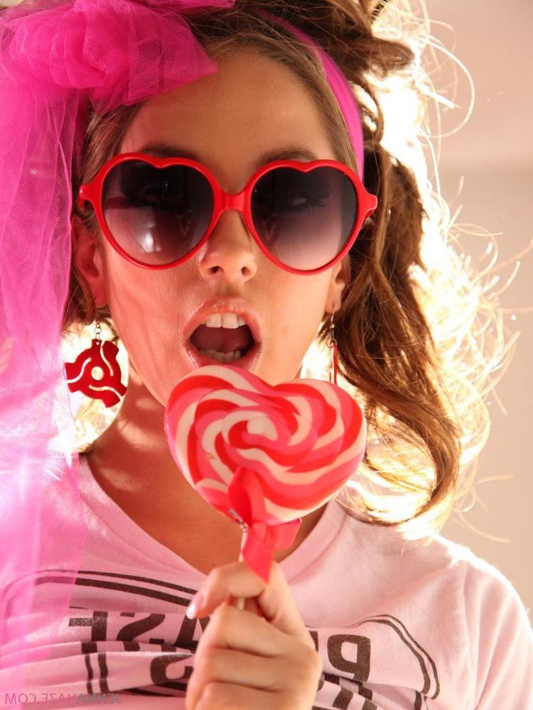 15P Jenna Haze sucking on a lollipop