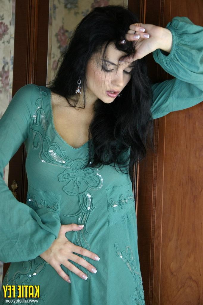15P Katie Fey in a sultry green dress