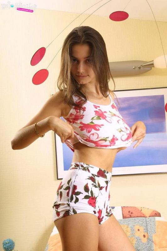 15P Busty teen model on a couch