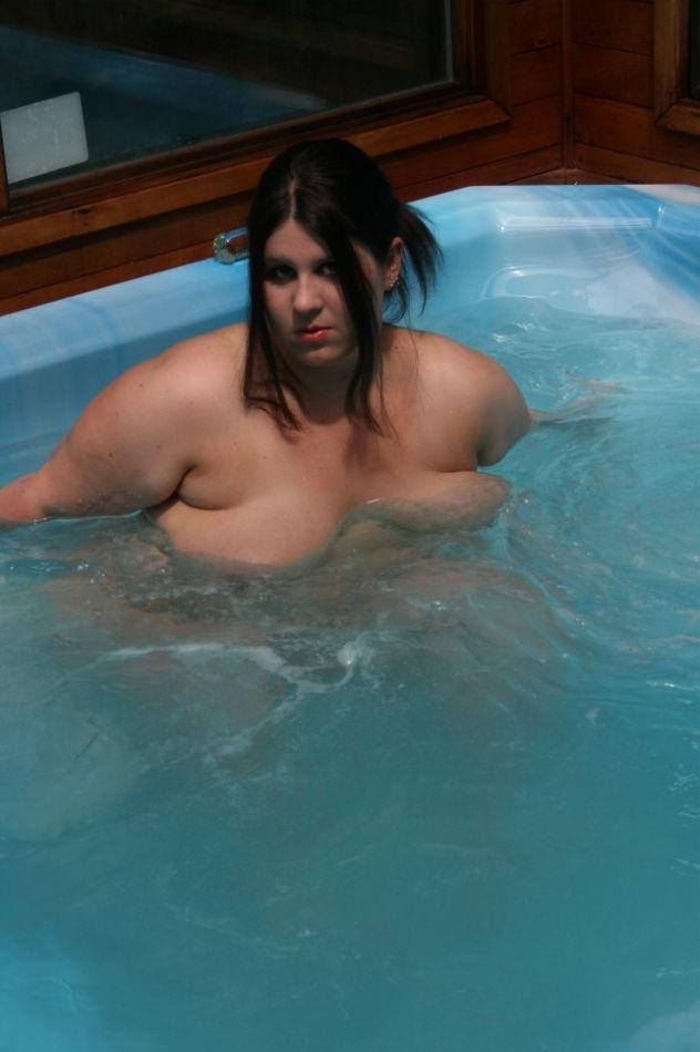 16P Brunette Plumper Crystal Plays with a Glass Dildo