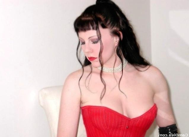 17P Brunette in corset and boots rubbing her pussy