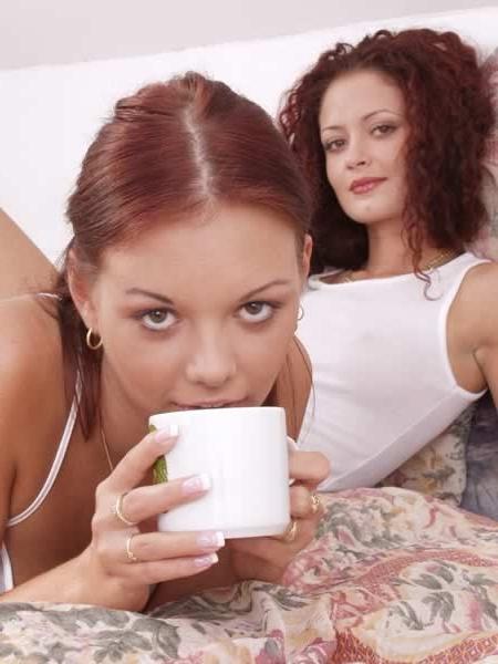 15P Two cute young lesbian babes fucking a dildo