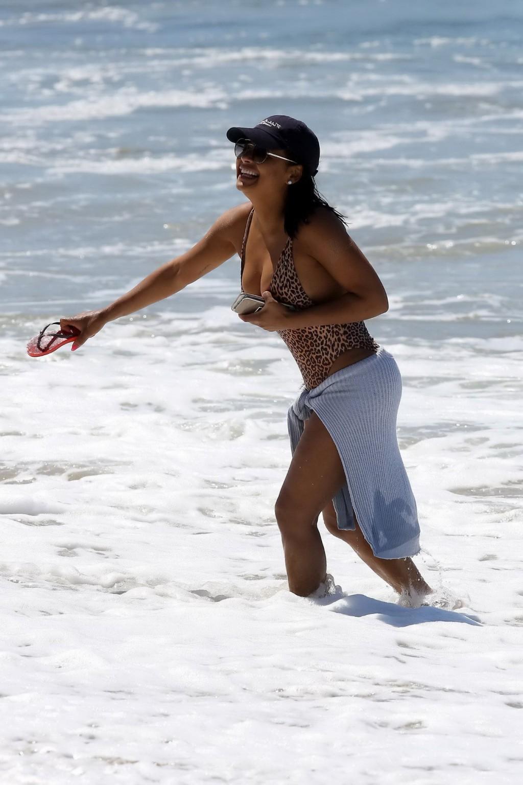 16P Christina Milian busty and booty in leopard printed swimsuit