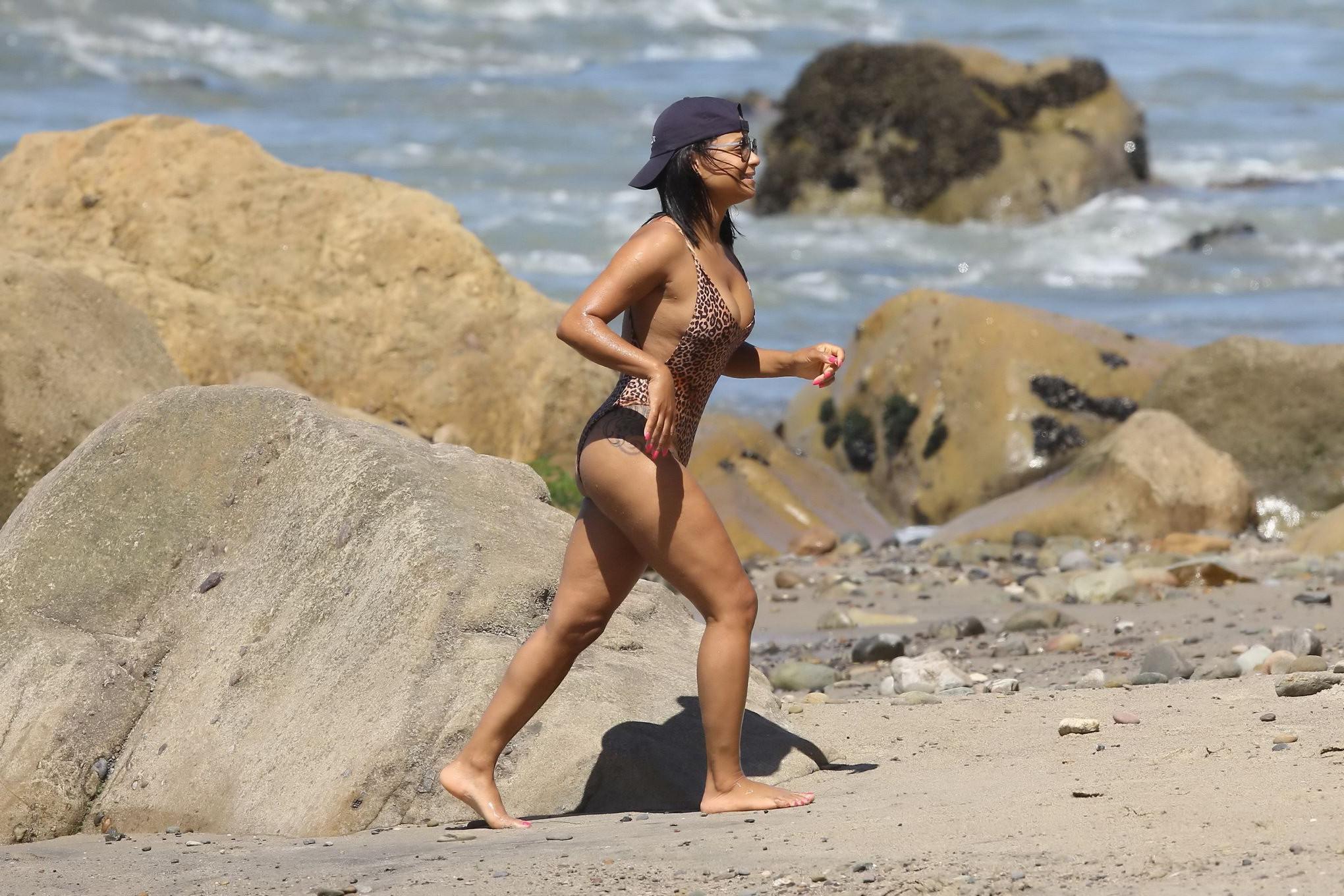 16P Christina Milian busty and booty in leopard printed swimsuit