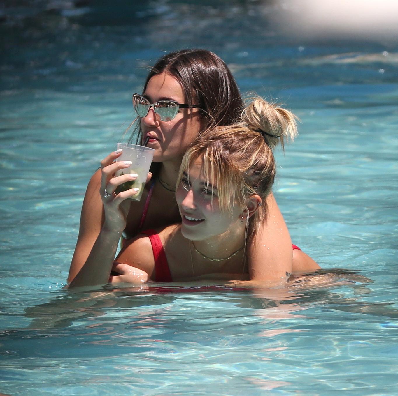 16P Hailey Baldwin showing pokies in red swimsuit
