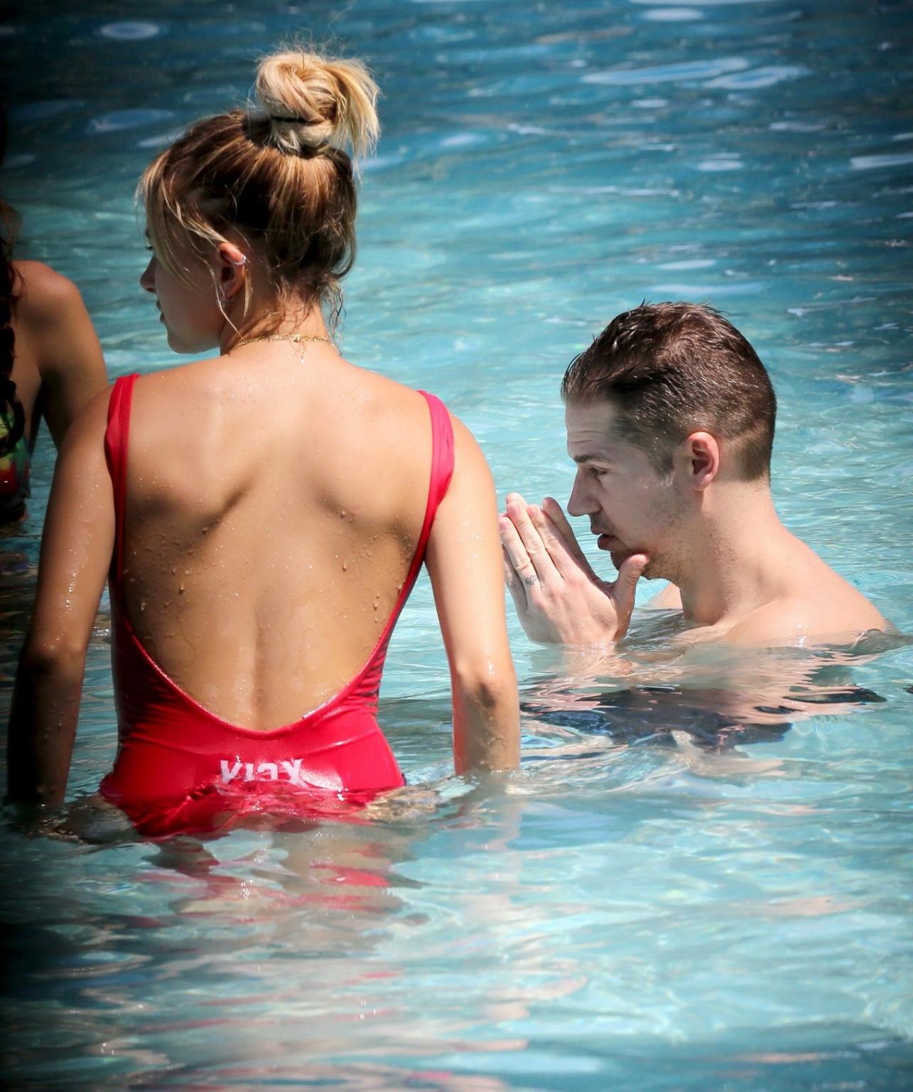 16P Hailey Baldwin showing pokies in red swimsuit