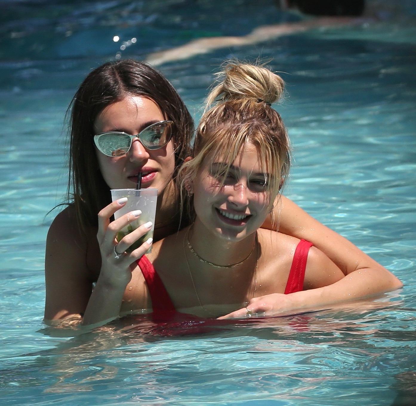16P Hailey Baldwin showing pokies in red swimsuit