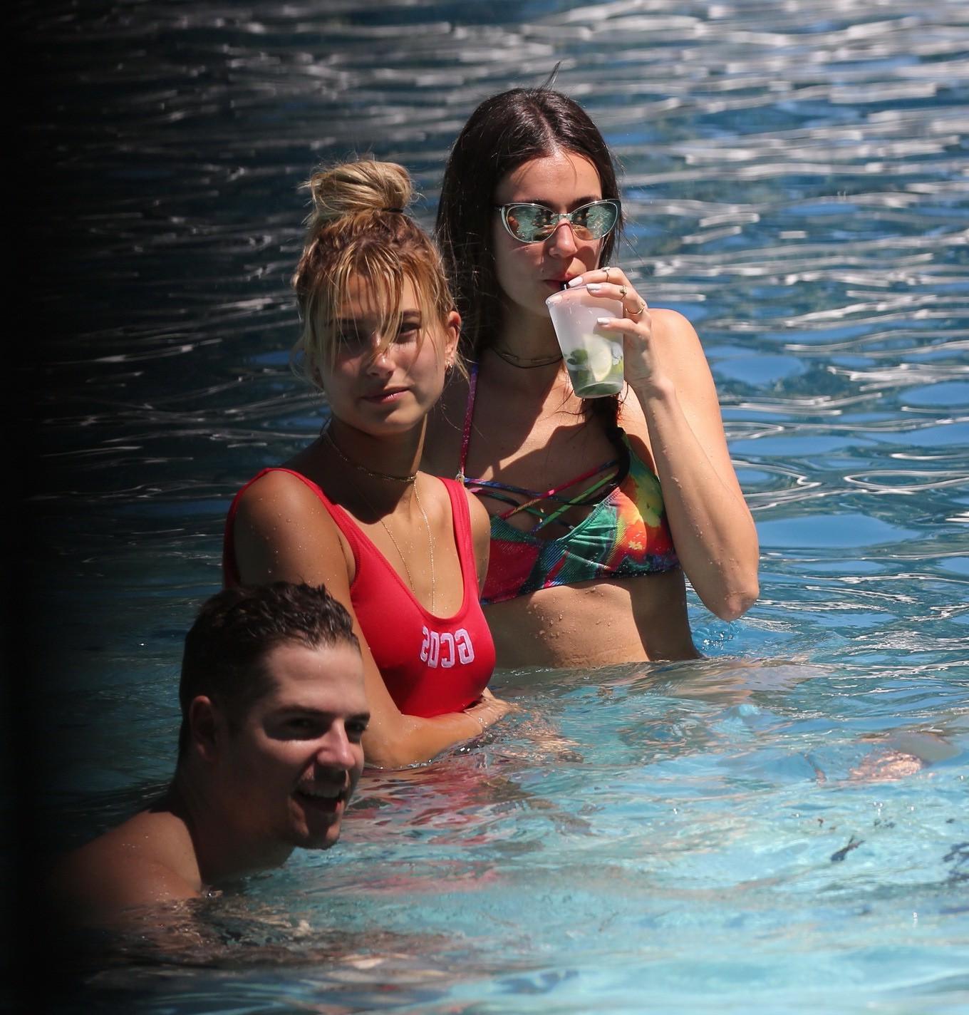 16P Hailey Baldwin showing pokies in red swimsuit