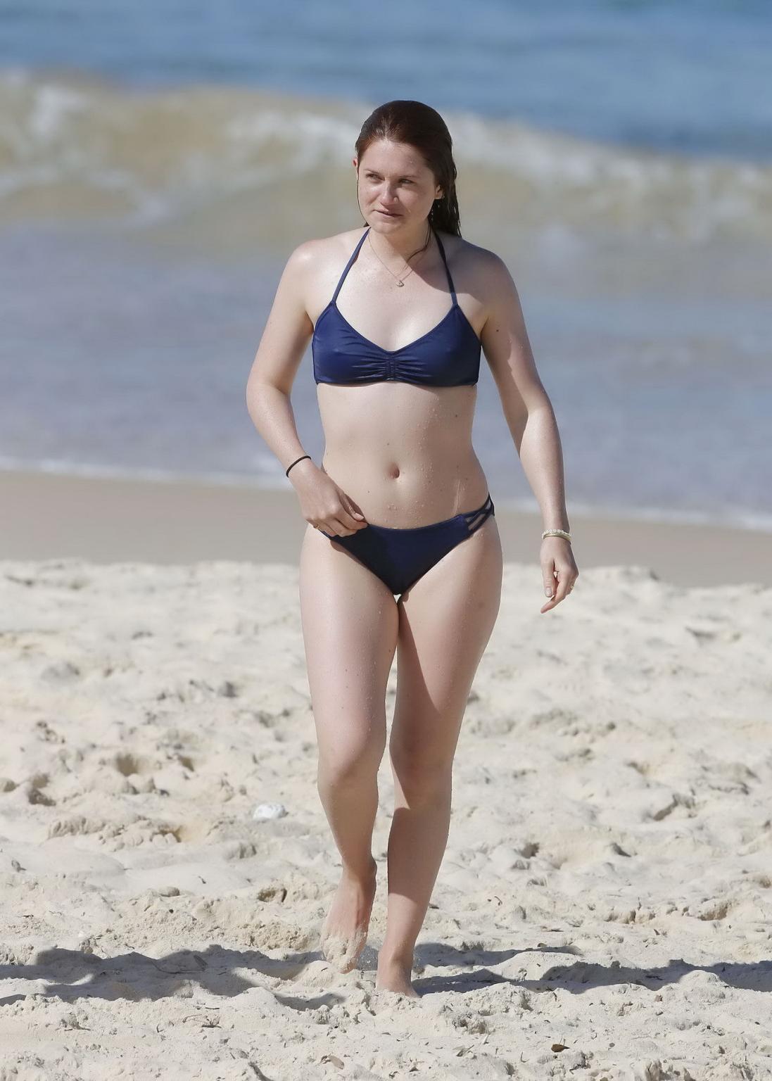 16P Bonnie Wright shows nipple pokies and ass in a blue bikini