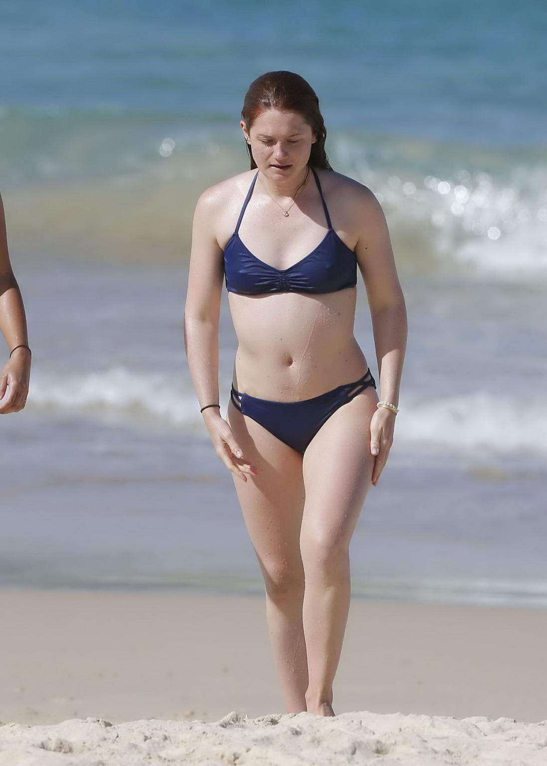 16P Bonnie Wright shows nipple pokies and ass in a blue bikini